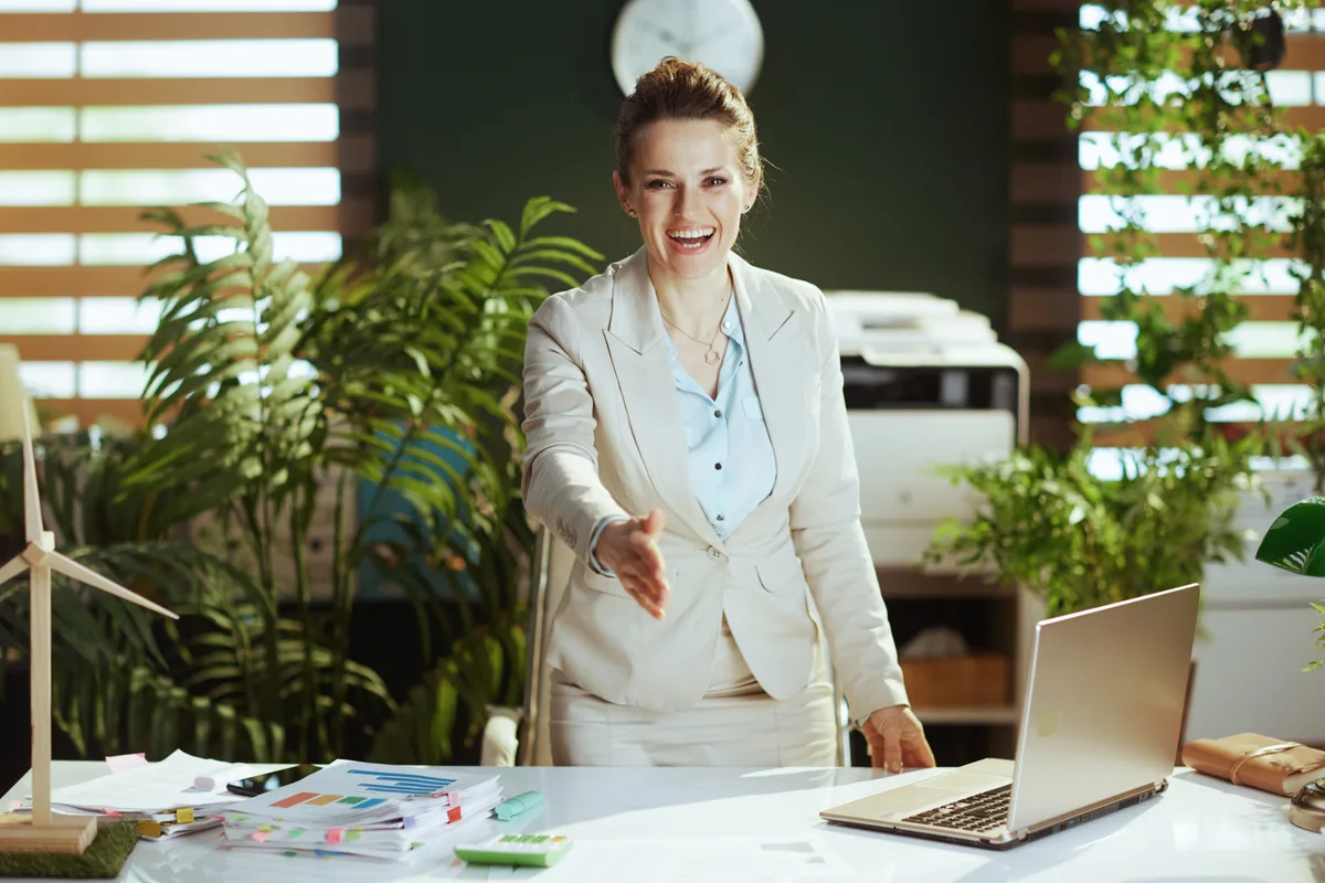 A lending advisor reviewing funding options with a small business owner across a desk