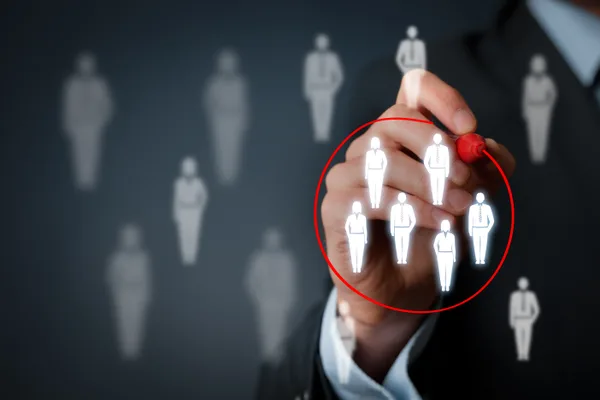 Marketing team segmenting email audiences for personalized messaging campaigns