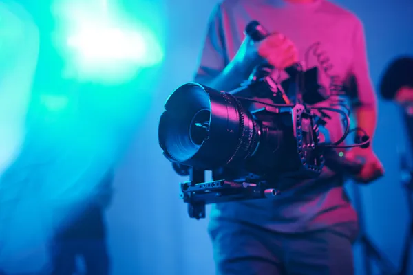 Marketing team producing video content without requiring professional studio equipment