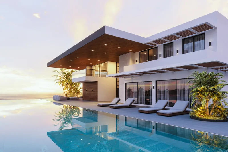 Cantilevered walnut canopy and infinity-edge pool of the Solana Point House at dusk