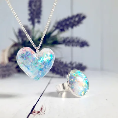 Opal heart pendant on a fine silver chain