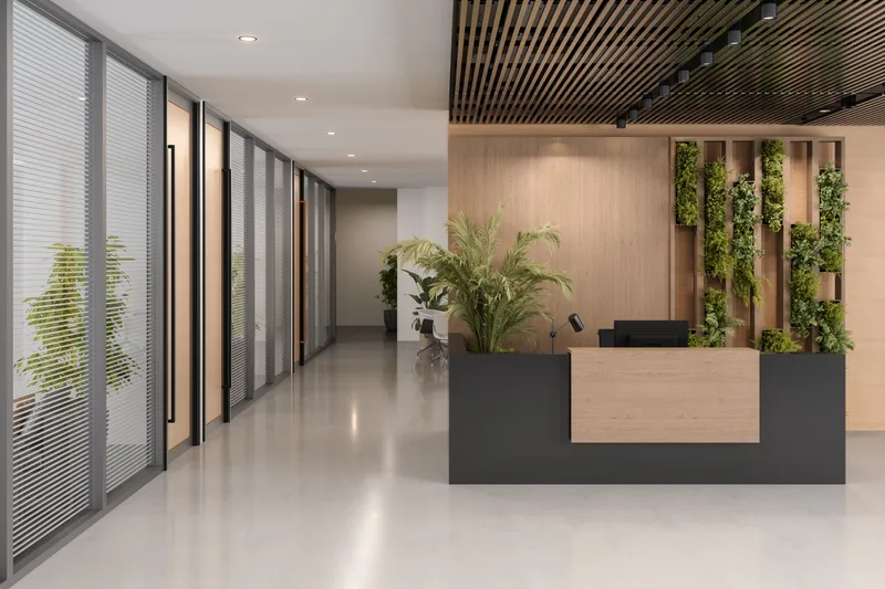 Main lobby information desk with clear sightlines to the corridor beyond, at a Riverbank clinic