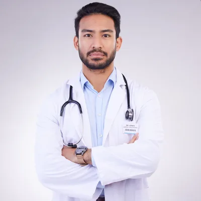 Dr. Omar Haddad, an internal medicine physician in a white coat with a stethoscope, arms crossed