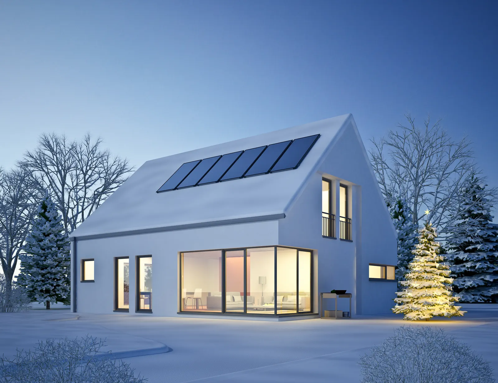 House with rooftop solar panels clear of snow while the yard around it is snow-covered