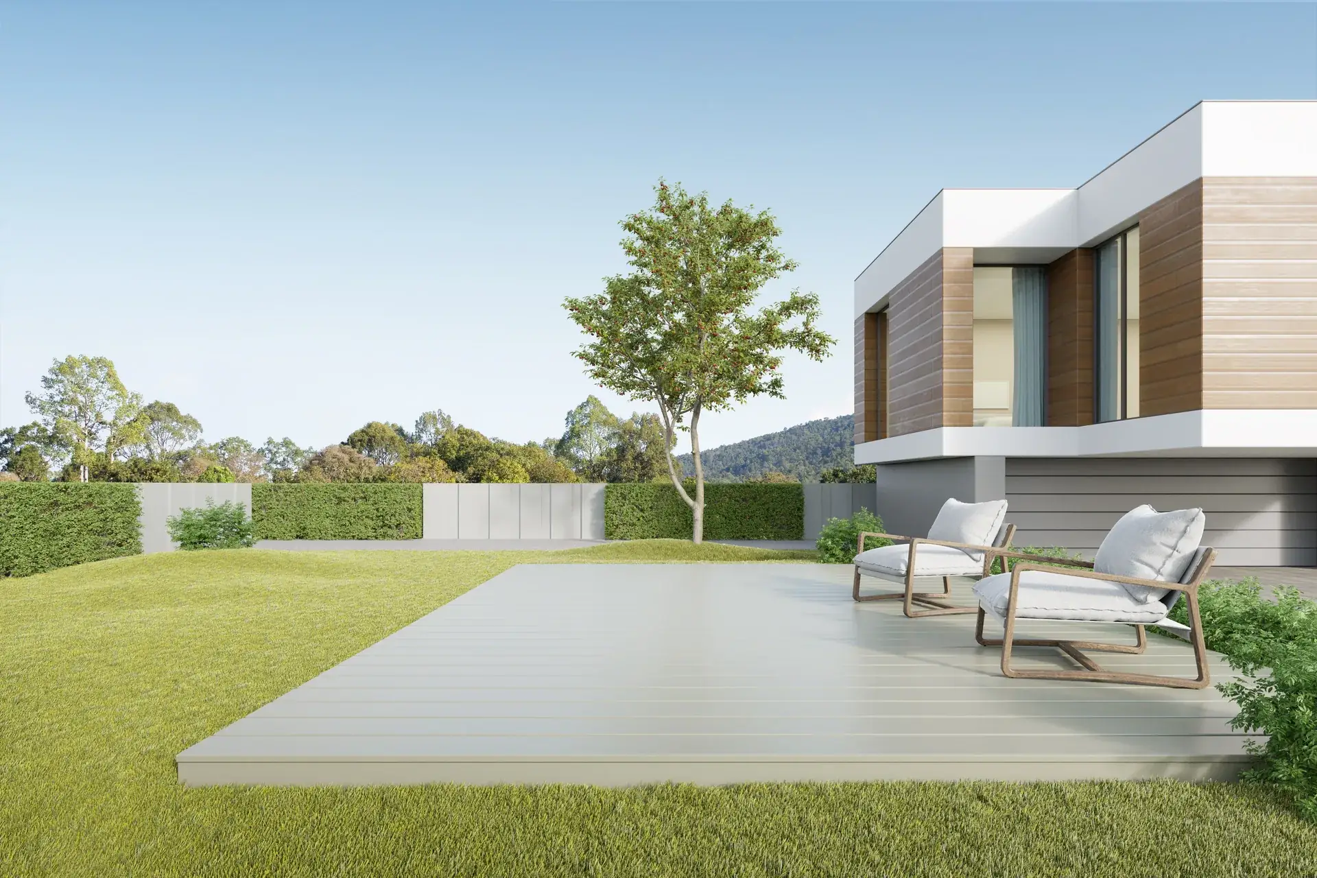 A modern Linden Vale house floating above its lawn, hills soft in the distance beyond the hedge line